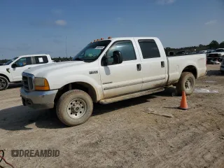 1999 Ford Super Duty F-250 XL with VIN 1FTNW21F9XED82013, listed as a Copart auction lot 44962945 with 394,926 mi miles and Clean Title. Bid and sale history available at carsss.com. Image 1.
