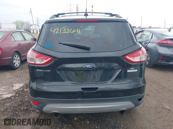 2013 Ford Escape SE with VIN 1FMCU0GX6DUC98598, listed as a IAAI auction lot 42133641 with 174,111 mi miles and . Bid and sale history available at DreamBid. Image 16.
