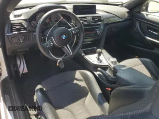 2015 BMW M4 with VIN WBS3R9C51FK334414, listed as a Copart auction lot 52451035 with 122,436 mi miles and Salvage title. Bid and sale history available at DreamBid. Image 8.