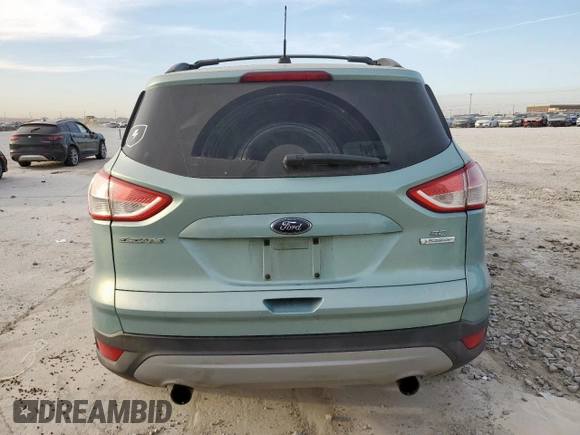 2013 Ford Escape SE with VIN 1FMCU0G97DUC34491, listed as a Copart auction lot 50516525 with 133,764 mi miles and Salvage title. Bid and sale history available at DreamBid. Image 6.