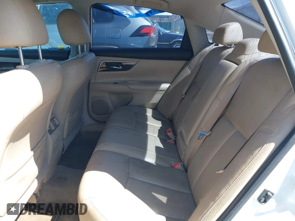 2014 Nissan Altima SV with VIN 1N4AL3AP6EC163563, listed as a IAAI auction lot 41964614 with 188,516 mi miles and . Bid and sale history available at DreamBid. Image 8.