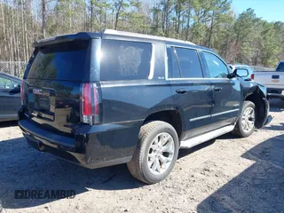 2015 GMC Yukon SLE with VIN 1GKS2AKC4FR720667, listed as a IAAI auction lot 41822277 with 134,984 mi miles and . Bid and sale history available at DreamBid. Image 4.