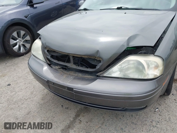 2002 Mercury Sable LS Premium with VIN 1MEHM55S22G612417, listed as a IAAI auction lot 42765760 with 102,735 mi miles and . Bid and sale history available at DreamBid. Image 6.