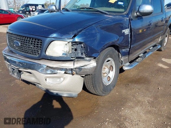 2002 Ford F-150 XLT with VIN 1FTRW07692KC25069, listed as a IAAI auction lot 41387047 with 208,811 mi miles. Bid and sale history available at carsss.com. Image 6.
