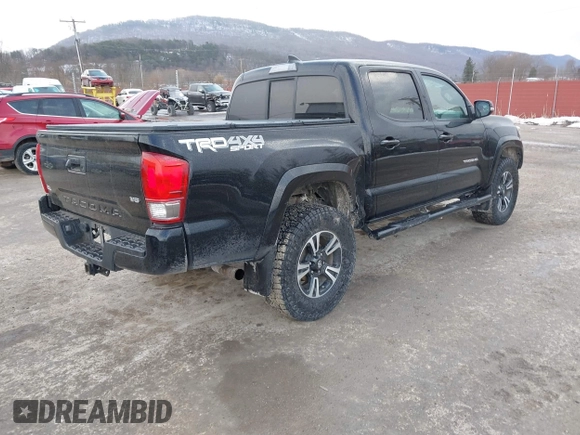 2016 Toyota Tacoma SR with VIN 3TMCZ5AN2GM027945, listed as a IAAI auction lot 41446277 with 51,781 mi miles and . Bid and sale history available at DreamBid. Image 4.