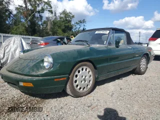 1991 Alfa Romeo Spider z VIN ZARBB42N0M6009468, wystawiony jako Copart lot #80524654 z przebiegiem 99 245 mil mil oraz Szkoda całkowita • Salvage title. Historia ofert i sprzedaży dostępna na DreamBid. Obrazek 1.