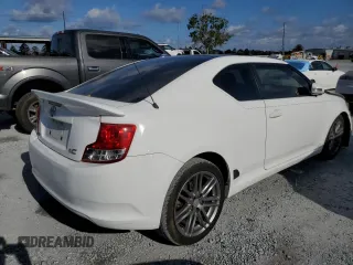 2011 Scion tC z VIN JTKJF5C70B3002270, wystawiony jako Copart lot #56605055 z przebiegiem 115 097 mil mil oraz Szkody całkowita. Historia ofert i sprzedaży dostępna na DreamBid. Obrazek 3.