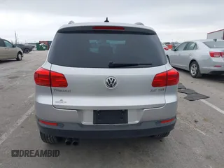 2015 Volkswagen Tiguan SE with VIN WVGAV7AX5FW592216, listed as a IAAI auction lot 41401020 with 110,726 mi miles and . Bid and sale history available at DreamBid. Image 17.