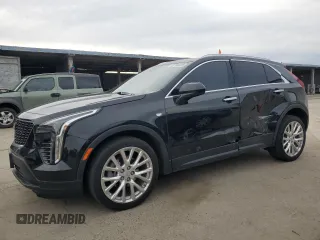 2022 Cadillac XT4 FWD Luxury with VIN 1GYAZAR42NF120533, listed as a Copart auction lot 43794025 with 54,862 mi miles and Salvage Title. Bid and sale history available at carsss.com. Image 1.