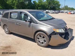 2011 Honda Odyssey EX with VIN 5FNRL5H45BB052943, listed as a IAAI auction lot 42023768 with 104,017 mi miles. Bid and sale history available at carsss.com. Image 1.