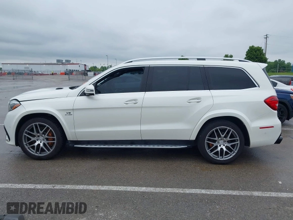 2018 Mercedes-Benz GLS 63 AMG with VIN 4JGDF7FE1JB099084, listed as a IAAI auction lot 42220385 with 97,904 mi miles and . Bid and sale history available at DreamBid. Image 14.
