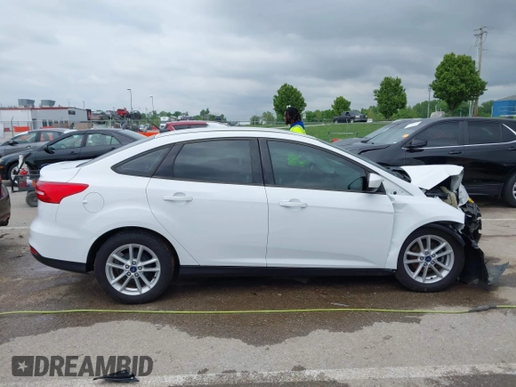 2018 Ford Focus SE z VIN 1FADP3F21JL257262, wystawiony jako IAAI lot #42174952 z przebiegiem 138 872 mil mil oraz . Historia ofert i sprzedaży dostępna na DreamBid. Obrazek 14.