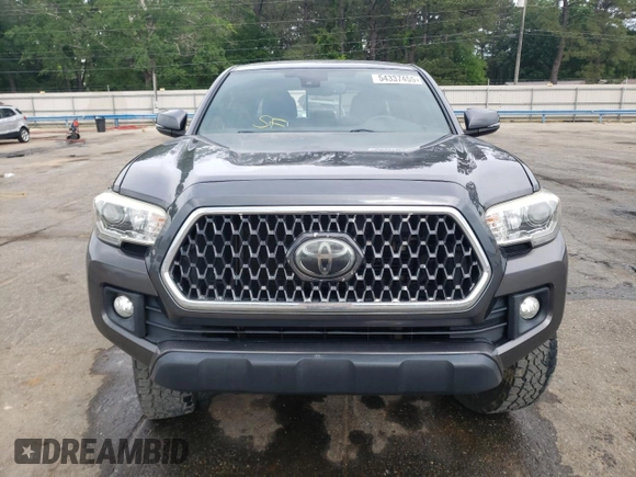 2018 Toyota Tacoma SR with VIN 5TFCZ5AN1JX147799, listed as a Copart auction lot 54337455 with 189,899 mi miles and Salvage Title. Bid and sale history available at DreamBid. Image 5.