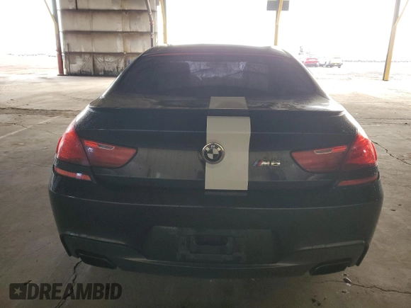 2014 BMW 6 Series 650i z VIN WBA6B2C56ED129901, wystawiony jako Copart lot #41619755 z przebiegiem 131 208 mil mil oraz Czysty tytuł • Clean title. Historia ofert i sprzedaży dostępna na DreamBid. Obrazek 6.