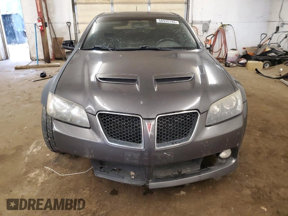 2009 Pontiac G8 z VIN 6G2ER57739L205634, wystawiony jako Copart lot #58935145 z przebiegiem 181 490 mil mil oraz Czysty tytuł • Clean title. Historia ofert i sprzedaży dostępna na DreamBid. Obrazek 5.