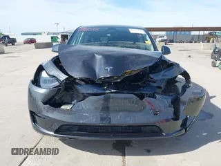 2024 Tesla Model Y with VIN 7SAYGDED9RF044789, listed as a IAAI auction lot 41817318 with Not Provided miles and . Bid and sale history available at carsss.com. Image 6.