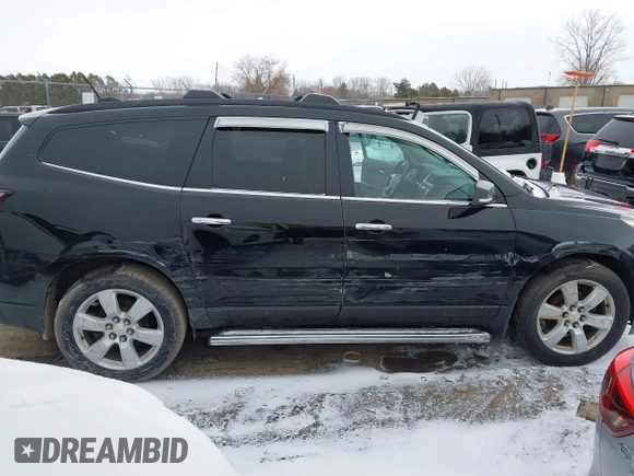 2016 Chevrolet Traverse LT with VIN 1GNKVGKDXGJ339394, listed as a IAAI auction lot 41709558 with 128,945 mi miles and . Bid and sale history available at DreamBid. Image 6.