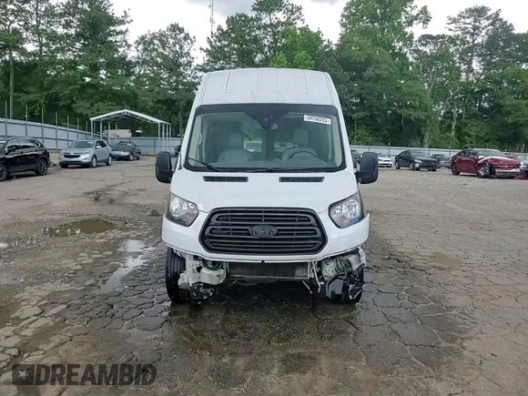 2016 Ford Transit Cargo z VIN 1FTYR3XM3GKB43476, wystawiony jako Copart lot #59758255 z przebiegiem 142 943 mil mil oraz Szkoda całkowita • Salvage title. Historia ofert i sprzedaży dostępna na DreamBid. Obrazek 14.