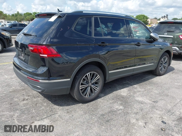 2024 Volkswagen Tiguan with VIN 3VVTB7AX9RM218526, listed as a IAAI auction lot 42564195 with Not provided miles and . Bid and sale history available at DreamBid. Image 4.