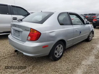 2005 Hyundai Accent GLS with VIN KMHCG35C75U354574, listed as a Copart auction lot 74931444 with 141,013 mi miles and Salvage Title. Bid and sale history available at carsss.com. Image 3.
