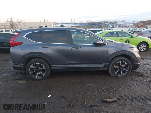 2017 Honda CR-V Touring with VIN 2HKRW2H94HH617081, listed as a IAAI auction lot 41294254 with 145,140 mi miles. Bid and sale history available at carsss.com. Image 13.