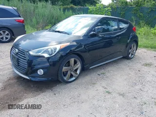 2013 Hyundai Veloster Turbo с VIN KMHTC6AE2DU111256, выставлен на аукционе IAAI как лот 42796383 с пробегом 127 660 миль миль и . История ставок и продаж доступна на DreamBid. Изображение 2.