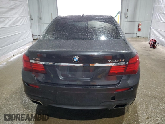 2015 BMW 7 Series 750Li xDrive z VIN WBAYF8C57FD653916, wystawiony jako Copart lot #52864275 z przebiegiem 138 811 mil mil oraz Szkoda całkowita • Salvage title. Historia ofert i sprzedaży dostępna na DreamBid. Obrazek 6.
