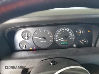 2003 Jeep Grand Cherokee Laredo with VIN 1J4GW48S23C617830, listed as a Copart auction lot 57481565 with 122,745 mi miles and Salvage title. Bid and sale history available at DreamBid. Image 9.