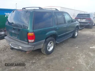 1999 Ford Explorer XLT z VIN 1FMZU32E7XZB57306, wystawiony jako IAAI lot #41519800 z przebiegiem 226 932 mil mil oraz . Historia ofert i sprzedaży dostępna na DreamBid. Obrazek 4.