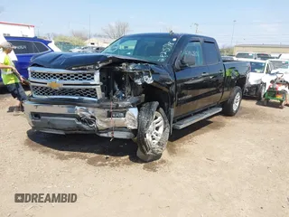 2014 Chevrolet Silverado 1500 LT with VIN 1GCVKREH9EZ282578, listed as a IAAI auction lot 42062801 with 163,158 mi miles and . Bid and sale history available at DreamBid. Image 19.