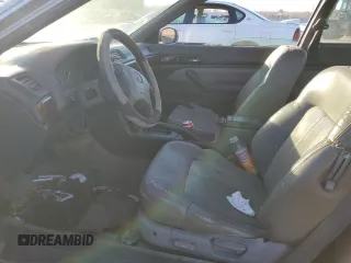 1997 Acura CL z VIN 19UYA1256VL005063, wystawiony jako Copart lot #83031204 z przebiegiem 120 250 mil mil oraz Szkoda całkowita • Salvage title. Historia ofert i sprzedaży dostępna na DreamBid. Obrazek 7.