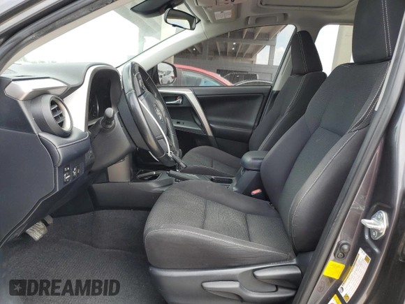 2018 Toyota RAV4 XLE with VIN JTMWFREV1JJ742694, listed as a Copart auction lot 51093695 with 74,502 mi miles and Salvage Title. Bid and sale history available at DreamBid. Image 7.