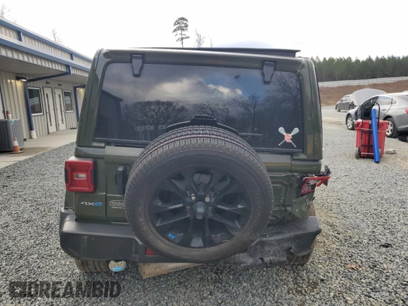 2023 Jeep Wrangler Sahara with VIN 1C4JJXP62PW553101, listed as a Copart auction lot 85543124 with 28,157 mi miles and Salvage Title. Bid and sale history available at DreamBid. Image 6.