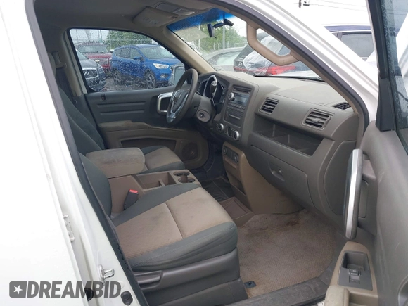 2006 Honda Ridgeline RTS z VIN 2HJYK16486H543139, wystawiony jako IAAI lot #42184129 z przebiegiem 260 840 mil mil oraz . Historia ofert i sprzedaży dostępna na DreamBid. Obrazek 5.