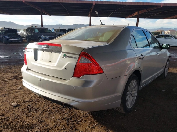 2011 Ford Fusion Hybrid with VIN 3FADP0L35BR256789, listed as a IAAI auction lot 40737584 with 133,683 mi miles. Bid and sale history available at carsss.com. Image 4.