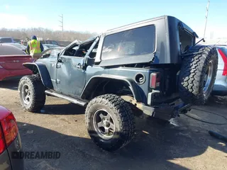 2007 Jeep Wrangler Rubicon with VIN 1J8GA64197L116283, listed as a IAAI auction lot 41008968 with 215,388 mi miles and . Bid and sale history available at DreamBid. Image 3.