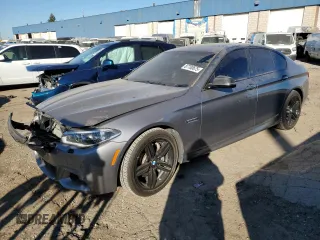 2016 BMW 5 Series 550i xDrive with VIN WBAKP9C53GD980579, listed as a Copart auction lot 87700675 with 99,512 mi miles and Clean title. Bid and sale history available at DreamBid. Image 1.