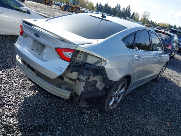2015 Ford Fusion SE with VIN 3FA6P0H98FR267586, listed as a IAAI auction lot 41987958 with 136,919 mi miles. Bid and sale history available at carsss.com. Image 4.