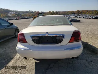 2002 Lincoln Continental with VIN 1LNHM97V62Y643532, listed as a Copart auction lot 76015984 with 154,374 mi miles and Salvage Title. Bid and sale history available at carsss.com. Image 6.