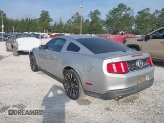 2012 Ford Mustang Premium with VIN 1ZVBP8AM7C5288124, listed as a IAAI auction lot 42280797 with 188,223 mi miles and . Bid and sale history available at DreamBid. Image 3.