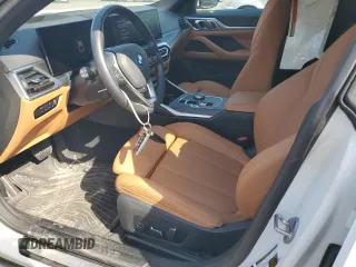 2024 BMW i4 xDrive40 z VIN WBY83FB06RFS94880, wystawiony jako Copart lot #45084805 z przebiegiem 7 053 mil mil oraz Szkoda całkowita • Salvage title. Historia ofert i sprzedaży dostępna na DreamBid. Obrazek 7.