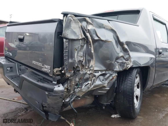 2012 Honda Ridgeline RT with VIN 5FPYK1F24CB456298, listed as a IAAI auction lot 40869948 with 123,329 mi miles. Bid and sale history available at carsss.com. Image 6.