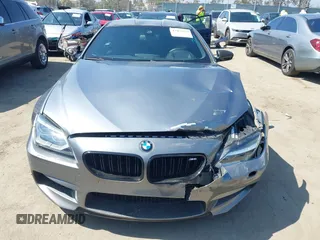 2013 BMW M6 with VIN WBSLX9C51DC968593, listed as a IAAI auction lot 42465979 with 88,010 mi miles and . Bid and sale history available at DreamBid. Image 12.