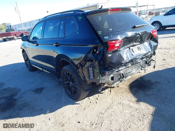 2022 Volkswagen Tiguan SE R-Line Black with VIN 3VVCB7AX9NM162825, listed as a IAAI auction lot 41272552 with 24,183 mi miles. Bid and sale history available at carsss.com. Image 3.