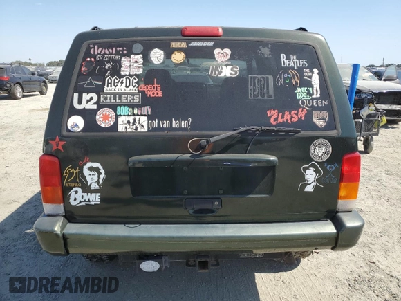 1998 Jeep Cherokee Sport with VIN 1J4FJ68S3WL150458, listed as a Copart auction lot 63278935 with 176,314 mi miles and Clean title. Bid and sale history available at DreamBid. Image 6.