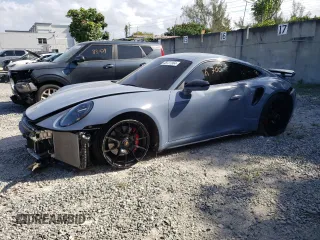 2023 Porsche 911 Turbo with VIN WP0AD2A94PS257369, listed as a Copart auction lot 48727904 with 6,700 mi miles. Bid and sale history available at carsss.com. Image 1.