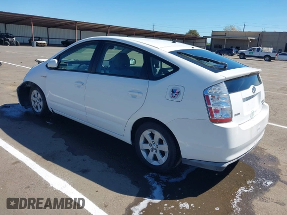 2007 Toyota Prius with VIN JTDKB20U977586376, listed as a IAAI auction lot 41848417 with 131,648 mi miles and . Bid and sale history available at DreamBid. Image 3.