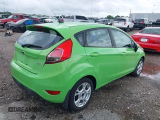 2014 Ford Fiesta SE z VIN 3FADP4EJ8EM233754, wystawiony jako IAAI lot #42108955 z przebiegiem 113 325 mil mil oraz . Historia ofert i sprzedaży dostępna na DreamBid. Obrazek 4.