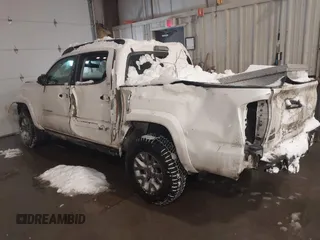2016 Toyota Tacoma SR with VIN 3TMCZ5AN5GM004885, listed as a IAAI auction lot 41569409 with 143,951 mi miles. Bid and sale history available at carsss.com. Image 3.