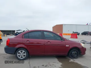 2007 Hyundai Accent GLS with VIN KMHCN46C57U108605, listed as a IAAI auction lot 41932061 with 195,580 mi miles. Bid and sale history available at carsss.com. Image 14.